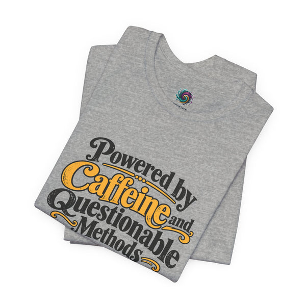 Heather gray graphic tee with “Powered by Caffeine and Questionable Methods” text, folded