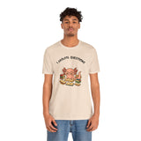 Cream short-sleeve crew t-shirt with axolotl reading books graphic and “Axolotl Questions” text