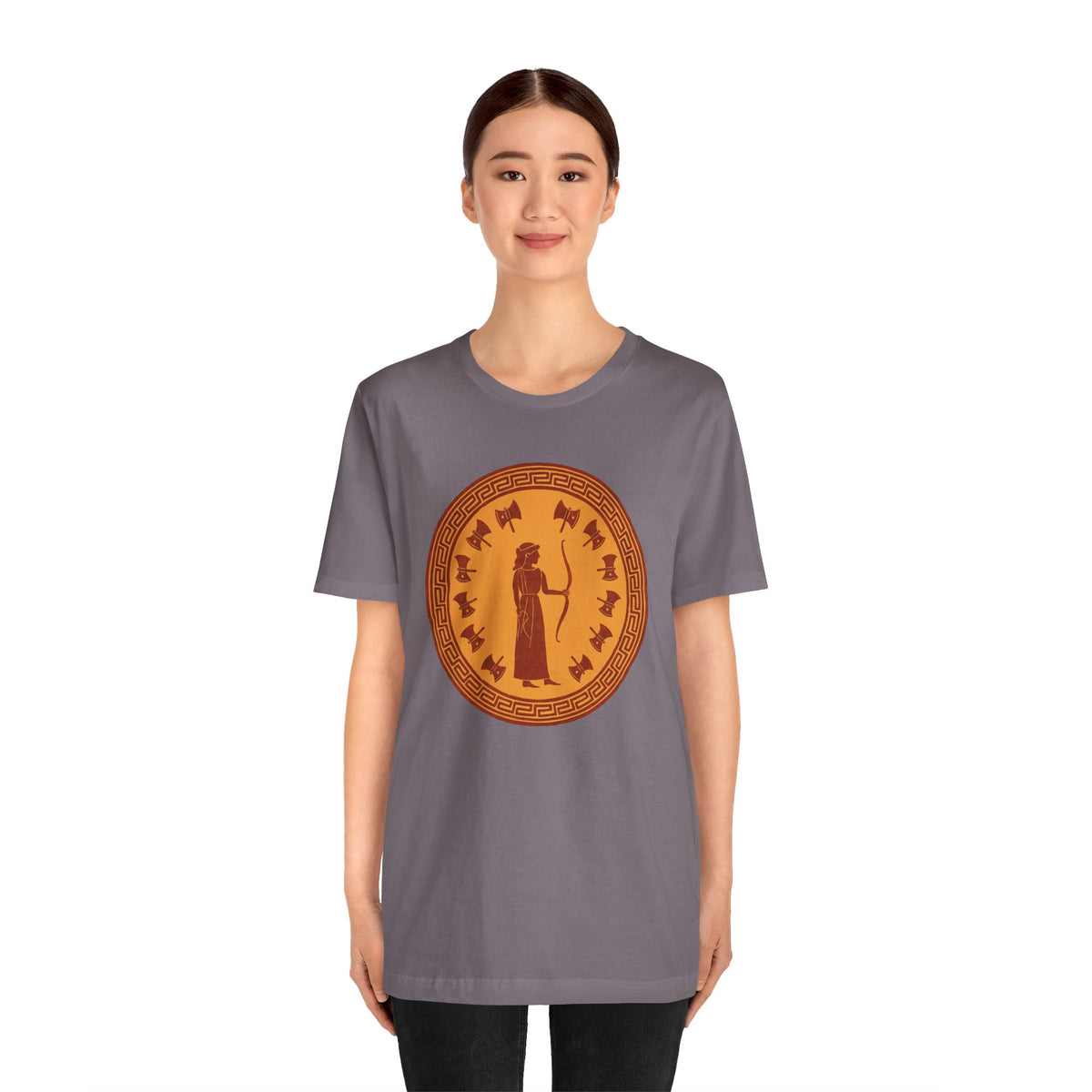 Gray-purple t-shirt with circular orange Greek goddess graphic on chest