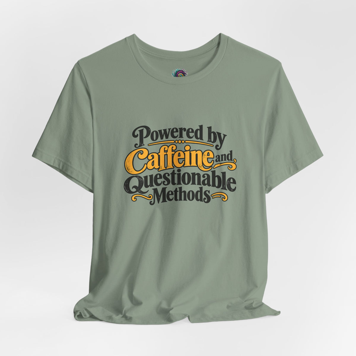 Sage green T-shirt with "Powered by Caffeine and Questionable Methods" front print