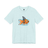 Light blue T-shirt with cartoon goldfish-and-shark graphic on the chest