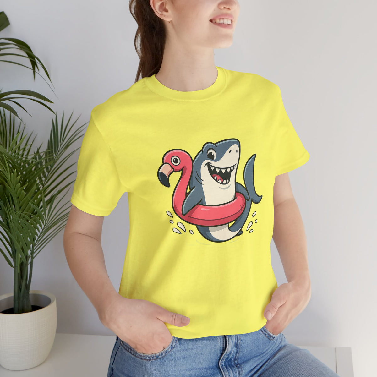 Lime yellow crewneck T-shirt with shark and flamingo float graphic, short sleeves