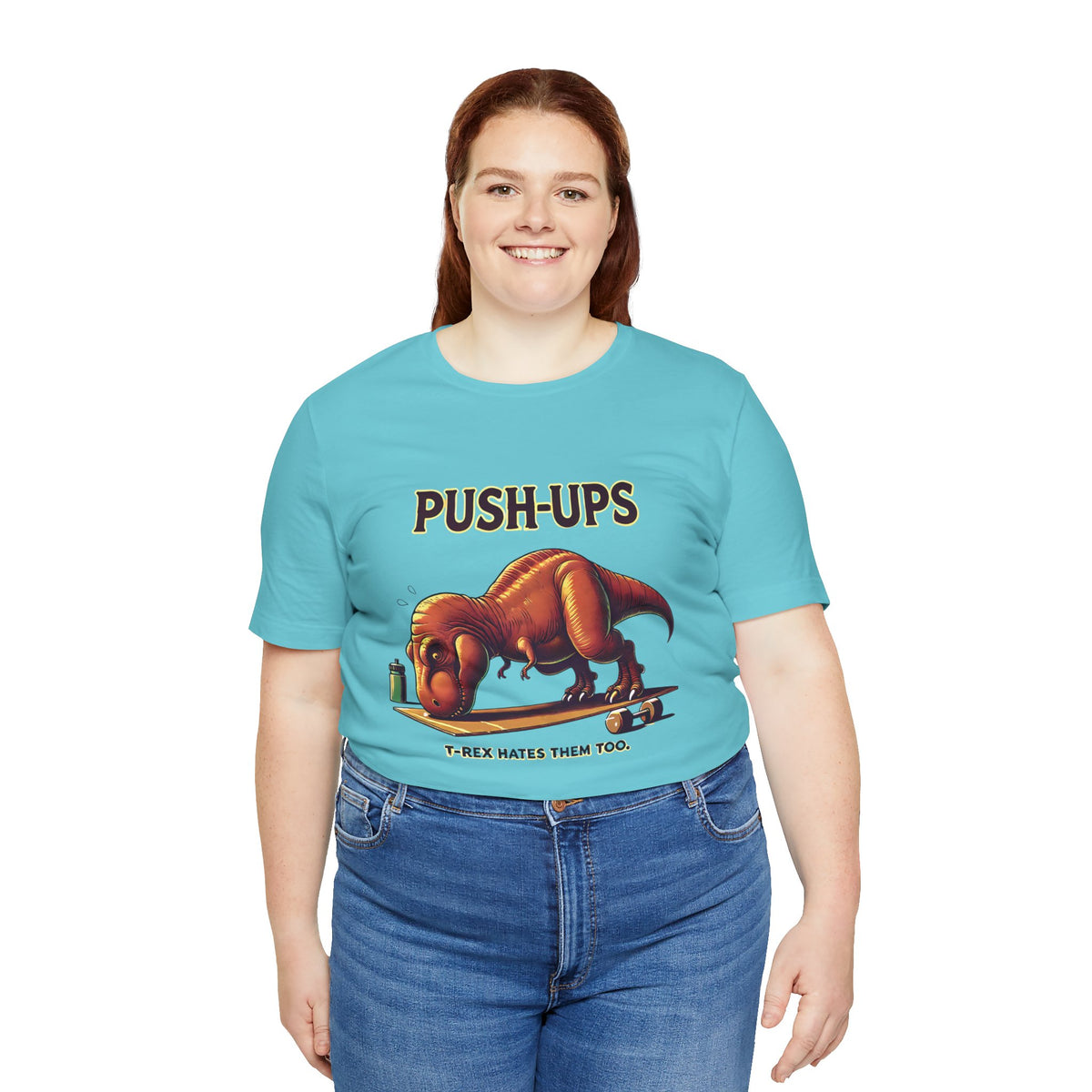 Turquoise T-shirt with T-rex 'Push-Ups' front graphic, worn by woman