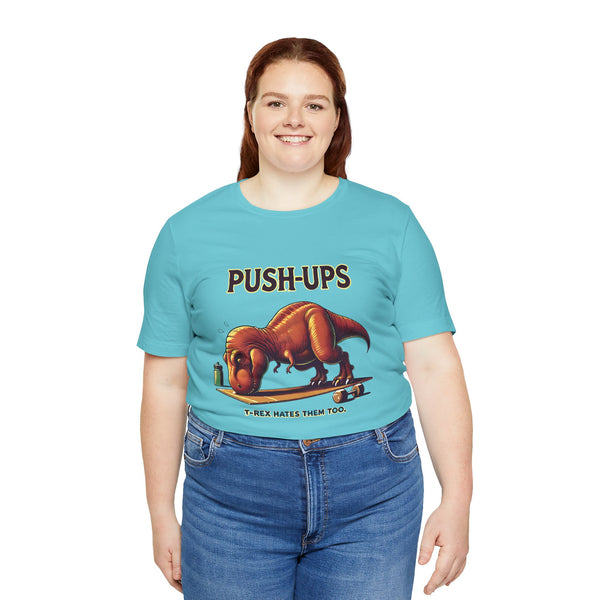 Turquoise T-shirt with T-rex 'Push-Ups' front graphic, worn by woman