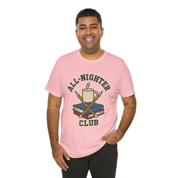 Pink crewneck T-shirt with “All-Nighter Club” coffee-and-books graphic on the chest