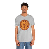Heather gray crewneck T-shirt with orange round myth figure graphic, worn front view