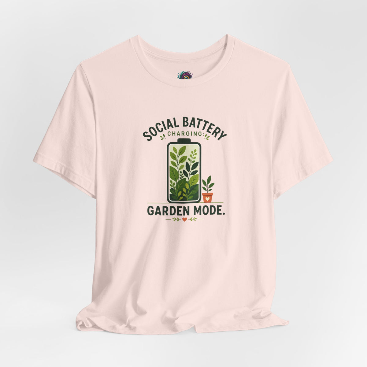 Light pink crew-neck T-shirt with “Garden Mode” text and potted plant graphic