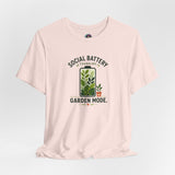 Light pink crew-neck T-shirt with “Garden Mode” text and potted plant graphic
