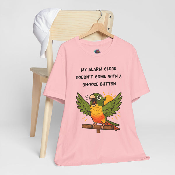 Pink parrot alarm T-shirt with “My alarm clock” text and green winged conure graphic