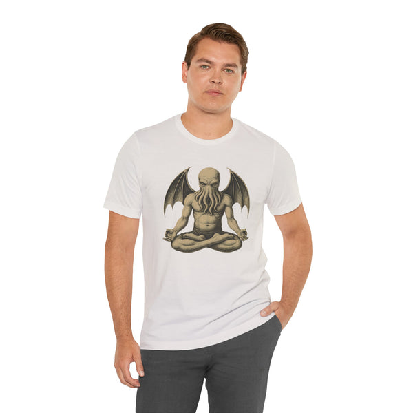 White unisex T-shirt on model, meditating sea monster graphic