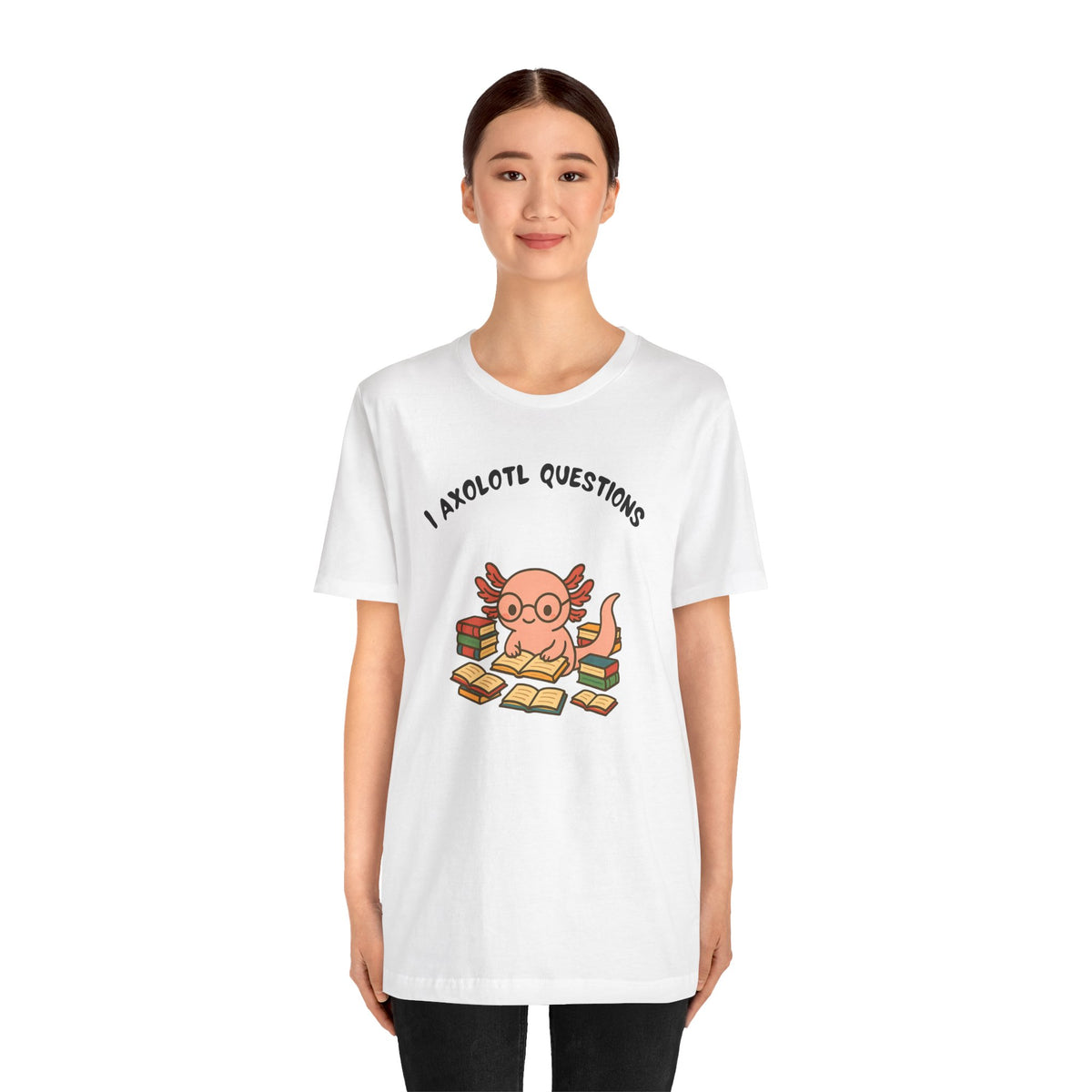 White crewneck t-shirt on female model with axolotl reading graphic and 'Axolotl Questions'