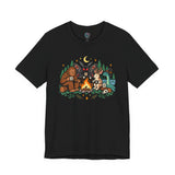 Black campfire cryptid T-shirt with colorful illustrated crew graphic