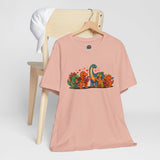 Blush pink short-sleeve T-shirt with dinosaur Valentine graphic on front