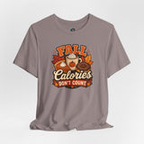 Taupe short-sleeve crewneck T-shirt with “Fall Calories Don’t Count” autumn food graphic