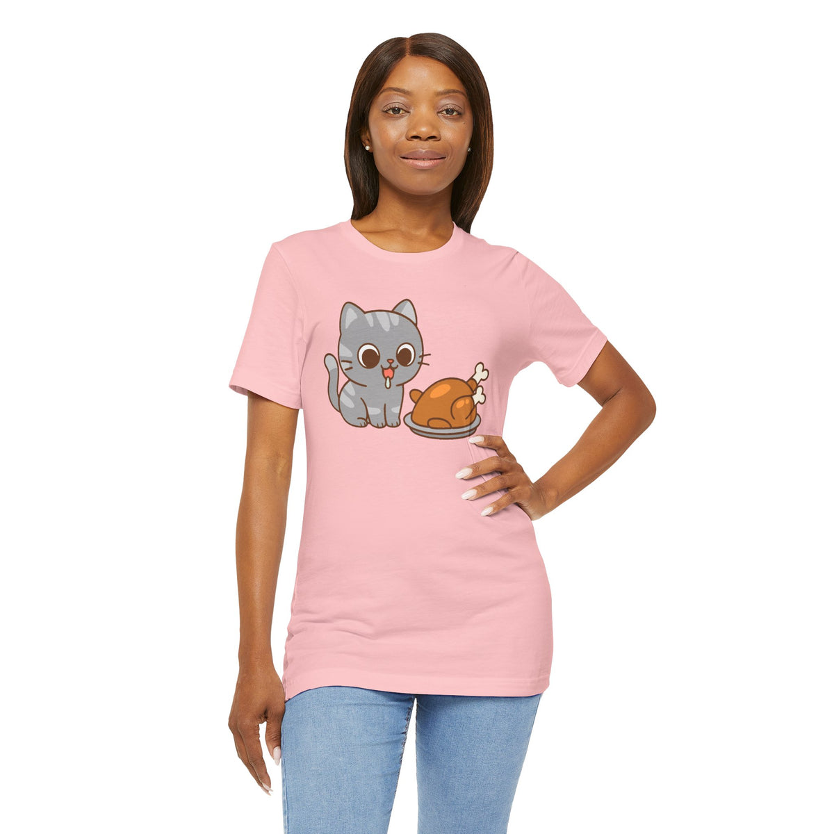 Pink crew-neck T-shirt with gray cat and brown roast graphic, side drape.