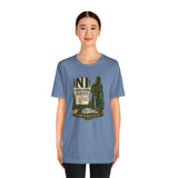 Light blue crewneck T-shirt with “NI Landscaping Service” graphic, worn by model full body.