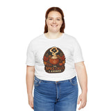 White crew-neck T-shirt with pumpkin-spice cauldron graphic, front
