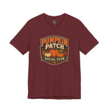 Maroon crew-neck T-shirt with “Pumpkin Patch Social Club” pumpkin graphic chest print