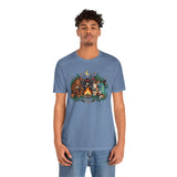 Blue crewneck T-shirt with campfire cryptid graphic, standing view