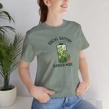 Sage green crew-neck T-shirt with garden-themed “SOCIAL BATTERY” graphic