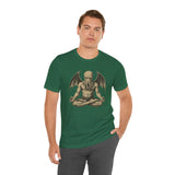 Green unisex T-shirt featuring a centered meditating monster print
