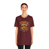 Maroon crew-neck T-shirt with center Pumpkin Patch Social Club pumpkin badge