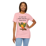 Pink parrot alarm T-shirt on model, showing conure graphic and “snooze button” slogan