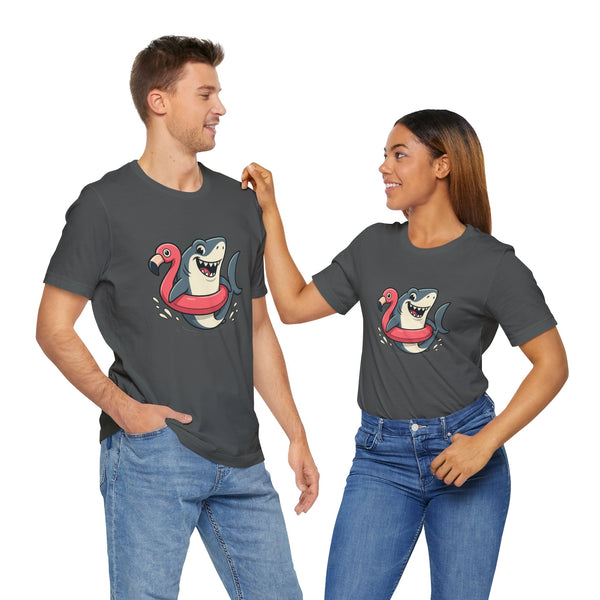 Couple wearing dark gray t-shirts with front shark and pink flamingo floatie graphic