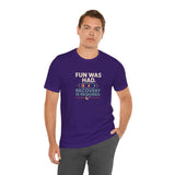 Purple crewneck t-shirt, short sleeves, “FUN WAS HAD” recovery graphic at center
