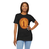 Black crew-neck t-shirt with orange circular Greek myth figure graphic, hands on hips