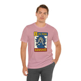 Pink t-shirt on model with “B is for Banshee” front graphic panel.