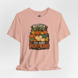 Blush pink crew-neck t-shirt with colorful pumpkin graphic on the front