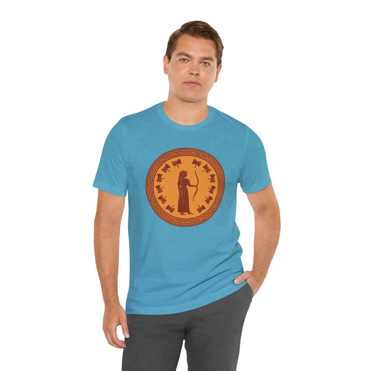 Sky blue crewneck T-shirt with orange circular Greek-style goddess graphic, slight side pose
