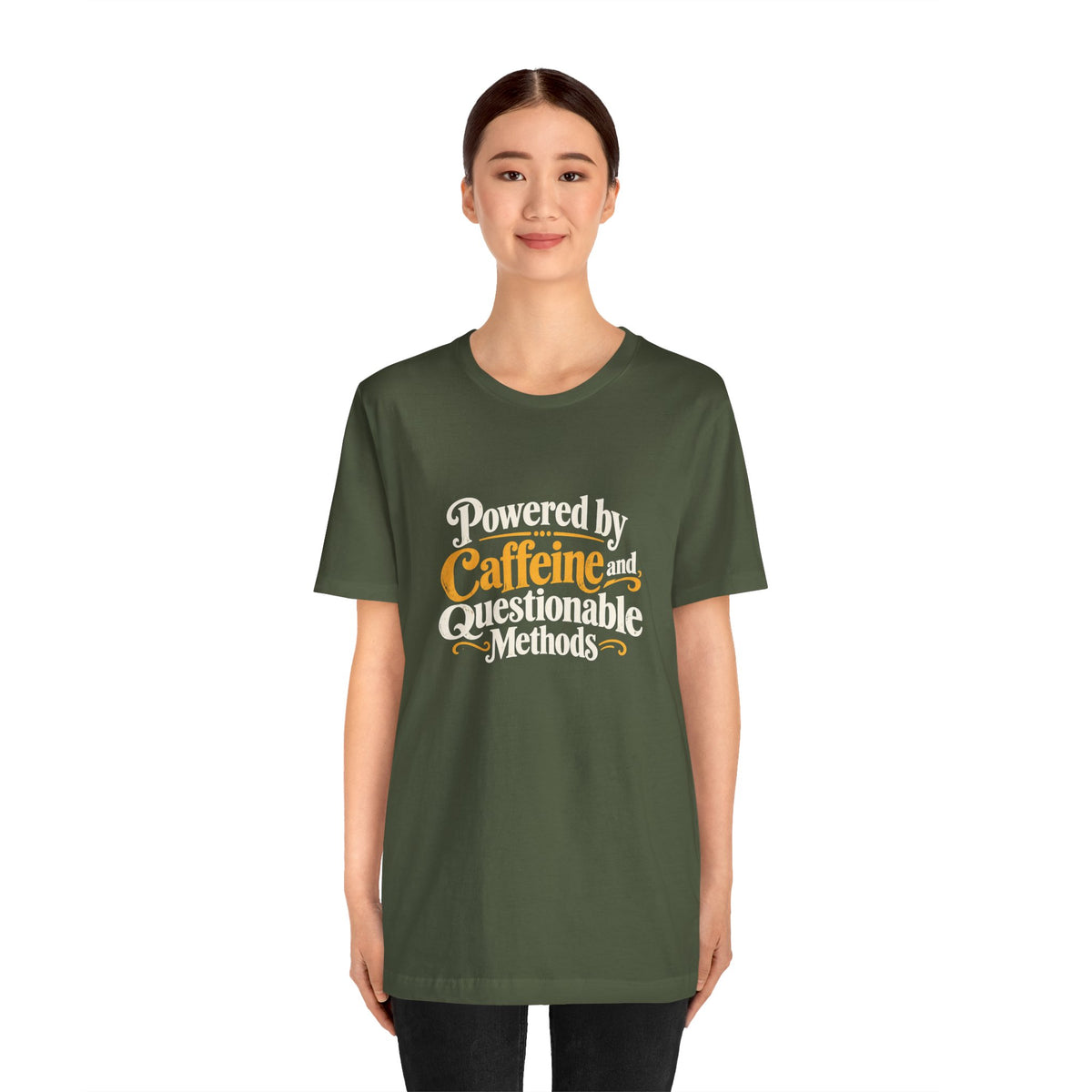 Military green crewneck tee with “Powered by Caffeine and Questionable Methods” front graphic