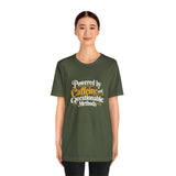 Military green crewneck tee with “Powered by Caffeine and Questionable Methods” front graphic
