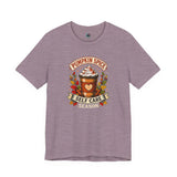 Heather mauve graphic T-shirt with pumpkin spice coffee cup and “Self Care Season” print