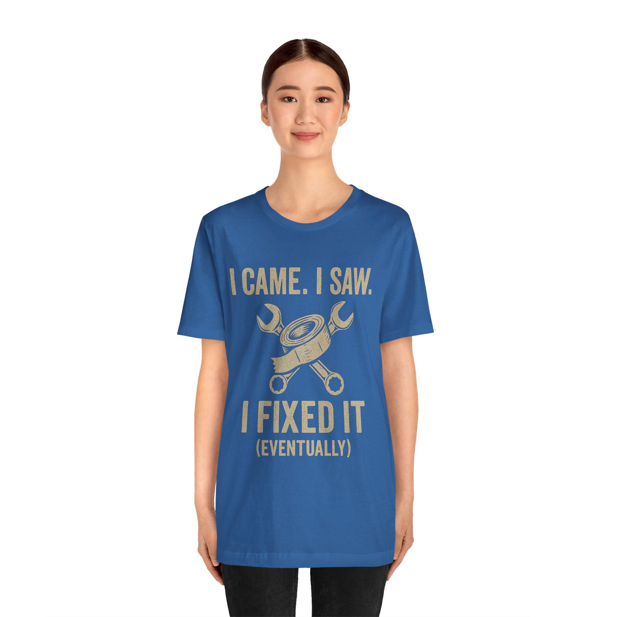 Blue crewneck T-shirt featuring gold “I Came, I Saw… I Fixed It (Eventually)” text and icon.