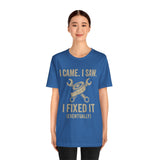 Blue crewneck T-shirt featuring gold “I Came, I Saw… I Fixed It (Eventually)” text and icon.