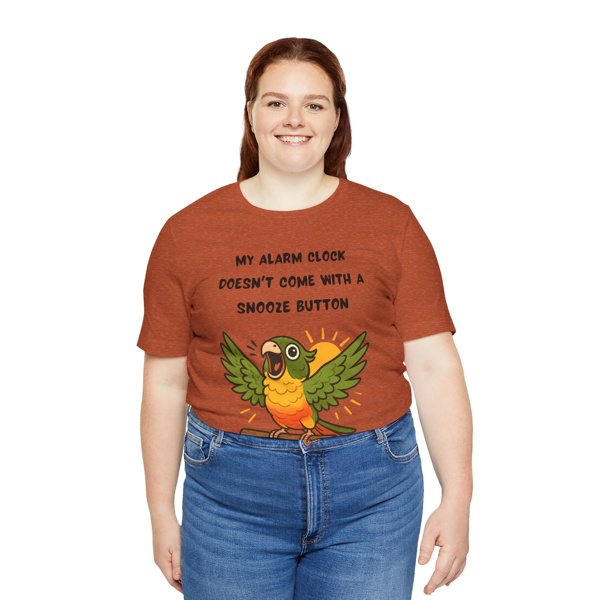 Rust parrot alarm graphic T-shirt with “MY ALARM CLOCK…SNOOZE BUTTON” lettering.