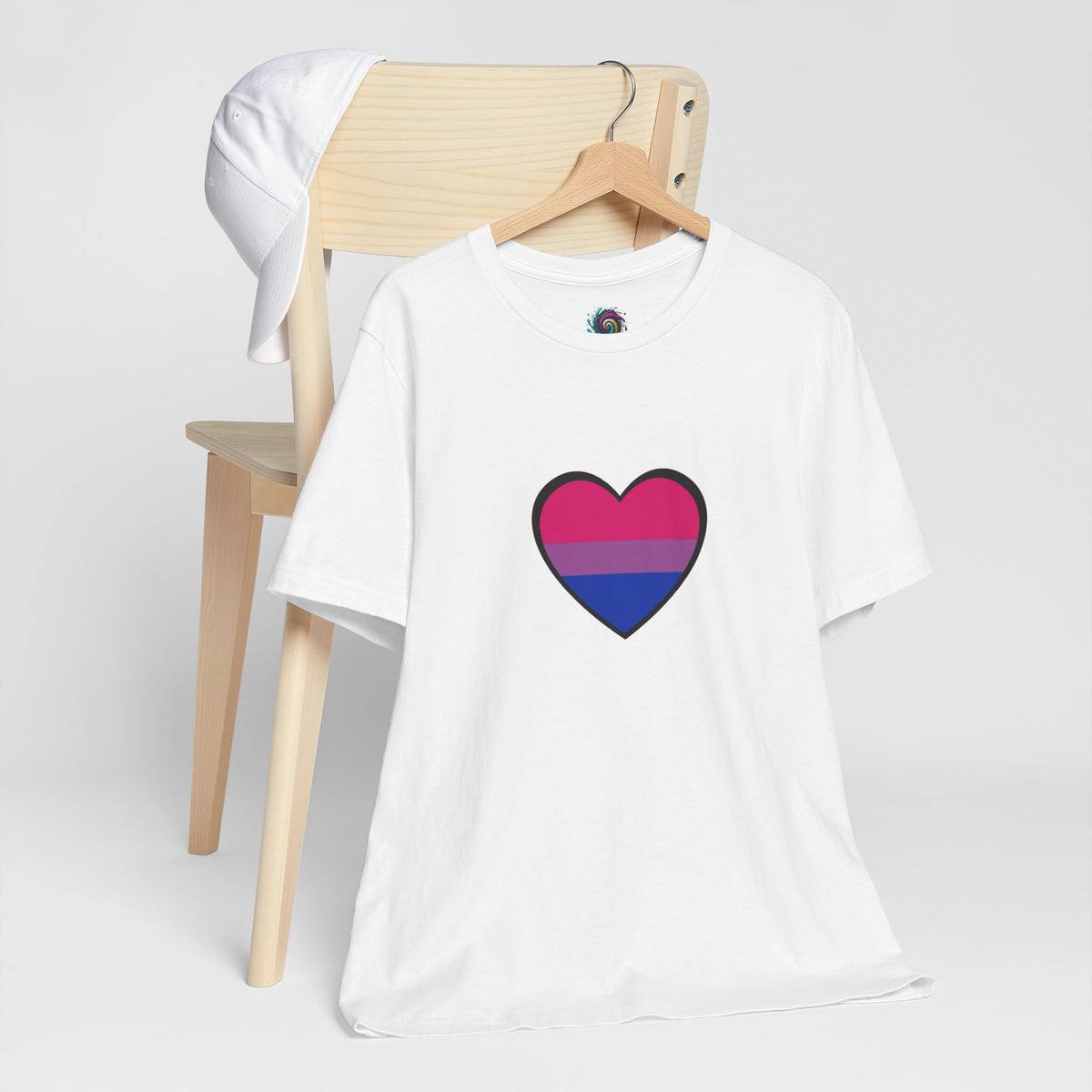 White crew-neck T-shirt with bisexual pride flag heart graphic on the front panel.