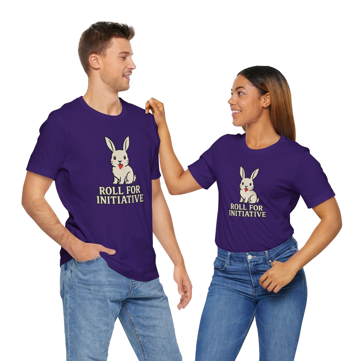 Two people wearing purple T-shirts with bunny graphic and “Roll for Initiative”