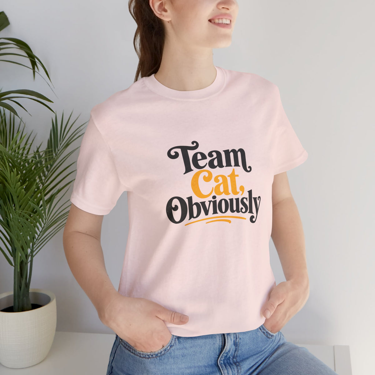 Soft pink crew-neck t-shirt with “Team Cat Obviously” cat graphic print on front
