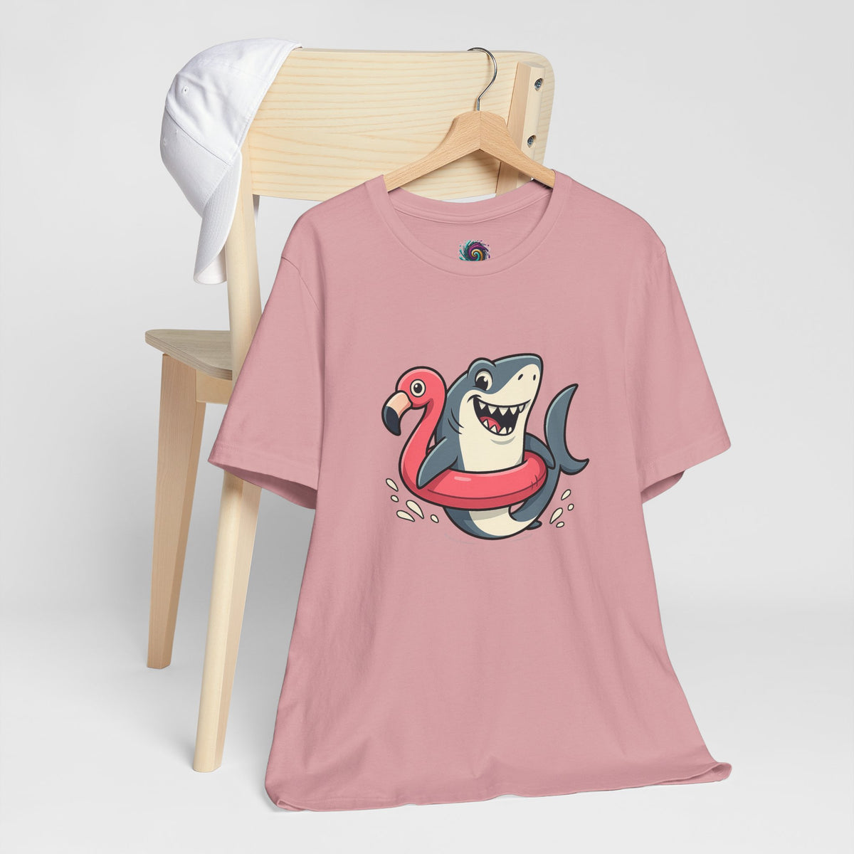 Pink shark graphic floatie T-shirt with flamingo character on front, crew neck