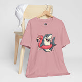 Pink shark graphic floatie T-shirt with flamingo character on front, crew neck
