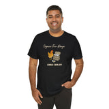 Black graphic T-shirt on model with chicken-and-eggs illustration on the chest