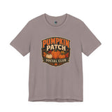 Gray-brown graphic T-shirt with Pumpkin Patch Social Club pumpkin logo