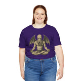 Team purple unisex crewneck T-shirt with meditating Cthulhu graphic, model wearing front
