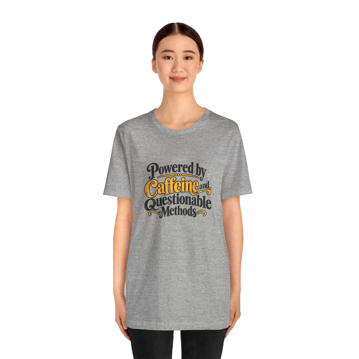 Heather gray T-shirt with colorful 'Powered by Caffeine and Questionable Methods' front graphic