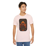 Light pink crewneck T-shirt with orange sci-fi pumpkin graphic centered