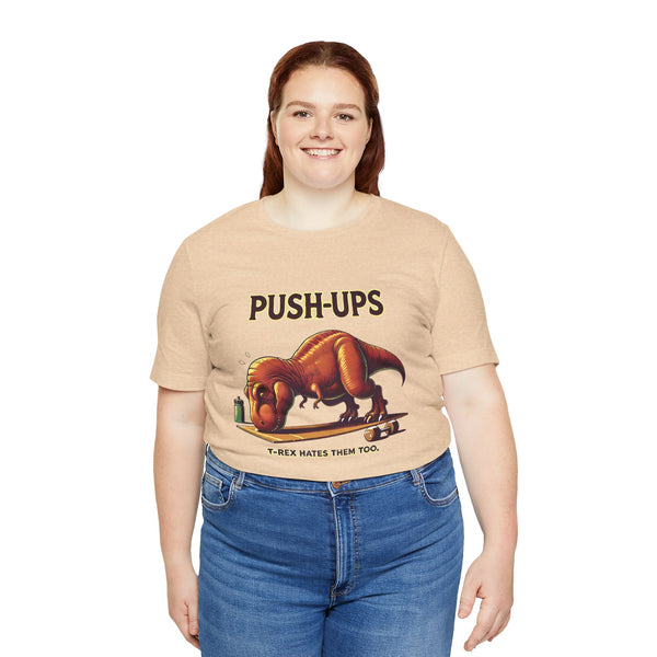 Beige crewneck T-shirt with 'PUSH-UPS' T-rex workout graphic, front view